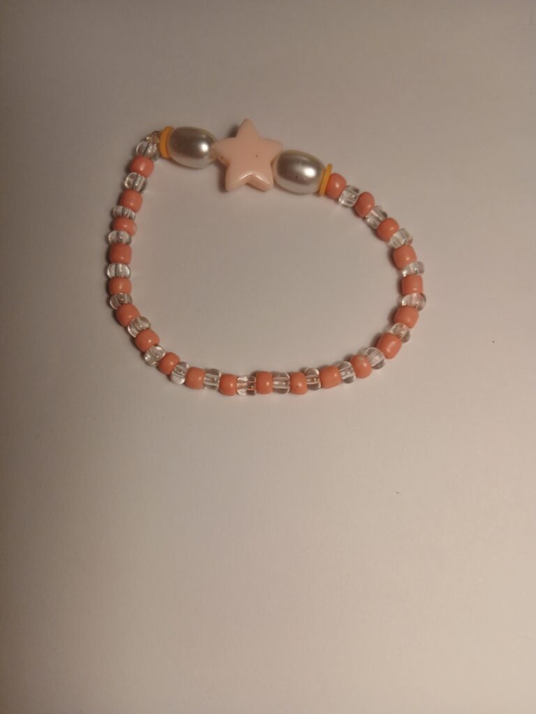 Oranje ster armbandje